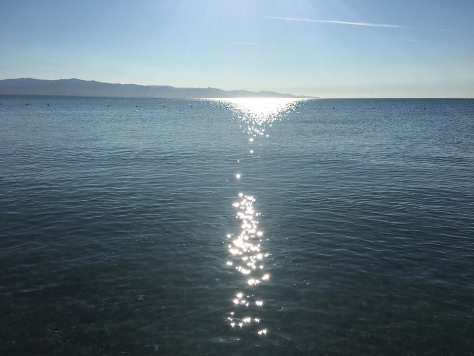 Cagliari, settembre da favola al Poetto: luci su uno splendido mare