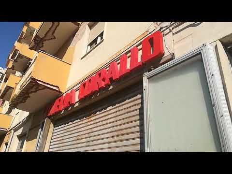 La Cagliari che non c’è più. In piazza Michelangelo resiste solo l’insegna del Cinema Corallo