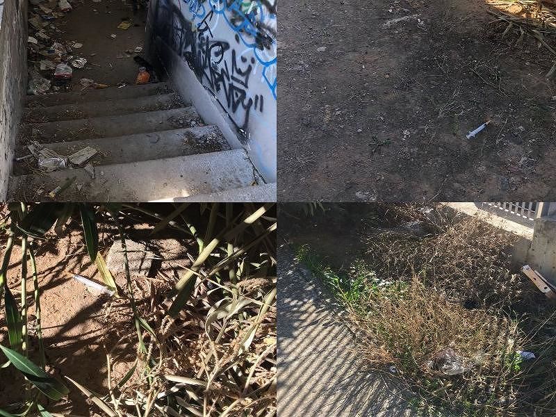 Pirri, tappeto di rifiuti e siringhe davanti a scuola e biblioteca. “Terra di nessuno”