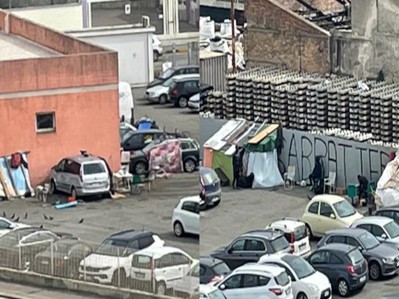 Cagliari, bivacchi di migranti dietro il dormitorio incendiato: tende e materassi nel parcheggione incustodito