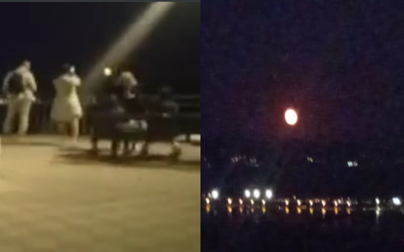 Cagliari, decine di curiosi con binocoli e cannocchiali in viale Europa per ammirare la Super Luna blu