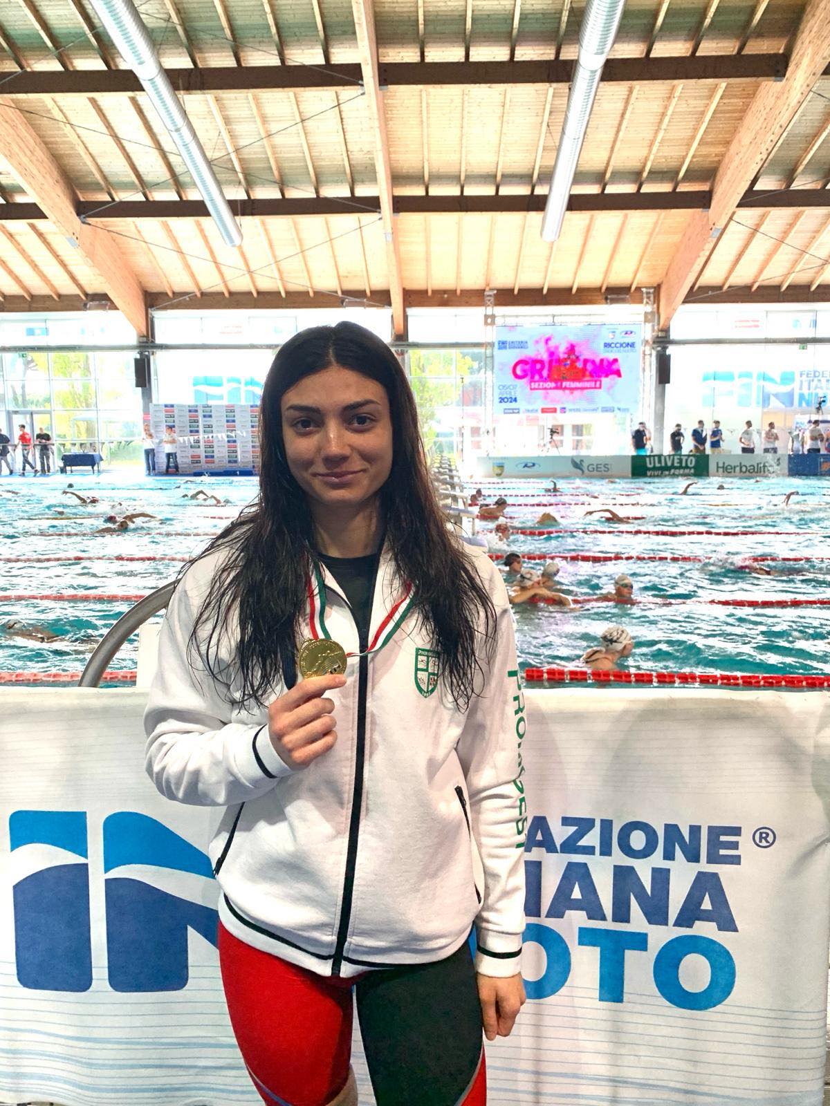 Nuoto, fantastica gara di Martina Fanunza della Promogest: conquista la medaglia d’oro a Riccione