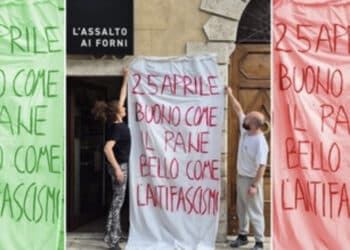 Espone uno striscione antifascista fuori dal panificio: identificata due volte dalla polizia