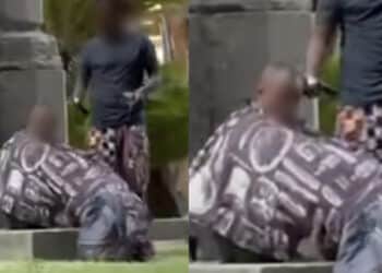 Cagliari, taglio di capelli in piazza del Carmine tra turisti e cittadini di passaggio