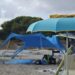 Maxi accampamento in spiaggia a Porto Pino, protestano i bagnanti