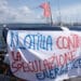 Carloforte, “Flotilla sarda, contro la speculazione energetica”: barche bloccano il porto per contrastare la devastazione della costa