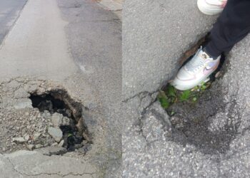 Sestu, buche e voragini talmente grandi da inghiottire i piedi dei passanti: in via Genova va in scena il paradosso