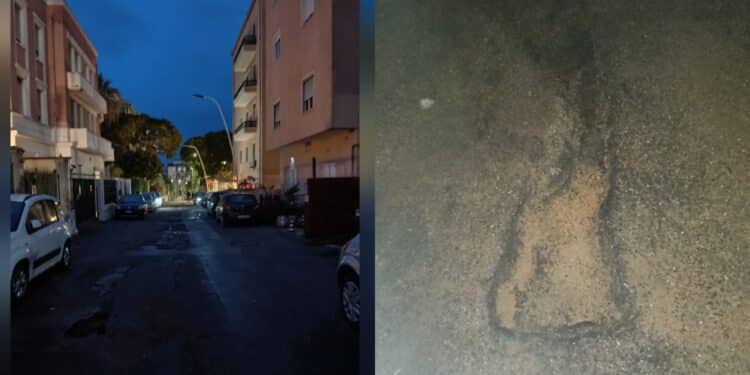 Cagliari, slalom tra le buche al buio: in via Milano si cammina con la torcia
