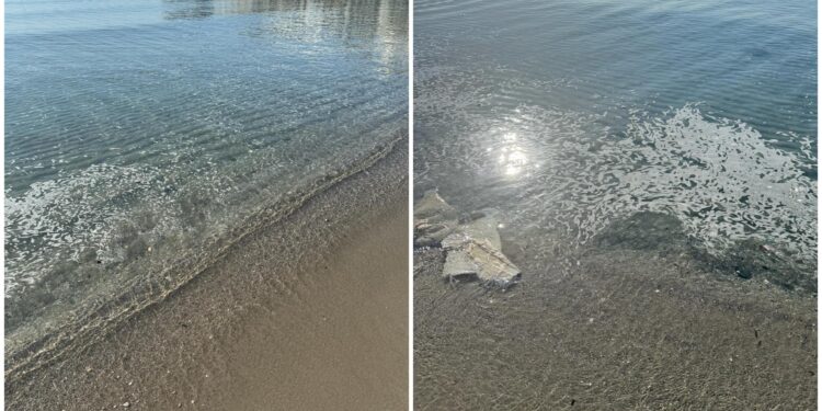 Cagliari, il Poetto invaso dalla schiuma da giorni: protestano i bagnanti, il Comune rassicura