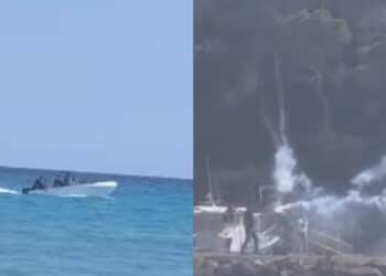 Porto Pino, festa in spiaggia dopo lo sbarco di un gruppo di migranti tra i bagnanti: razzi sparati in aria e fumogeni