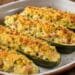 La cultura nel piatto, zucchine ripiene di patate e prosciutto cotto gratinate al forno