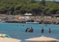 Algerini sbarcano in pieno giorno a Porto Pino fra turisti e bagnanti increduli
