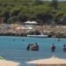 Algerini sbarcano in pieno giorno a Porto Pino fra turisti e bagnanti increduli
