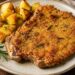 La cultura nel piatto: braciola di maiale impanata al forno